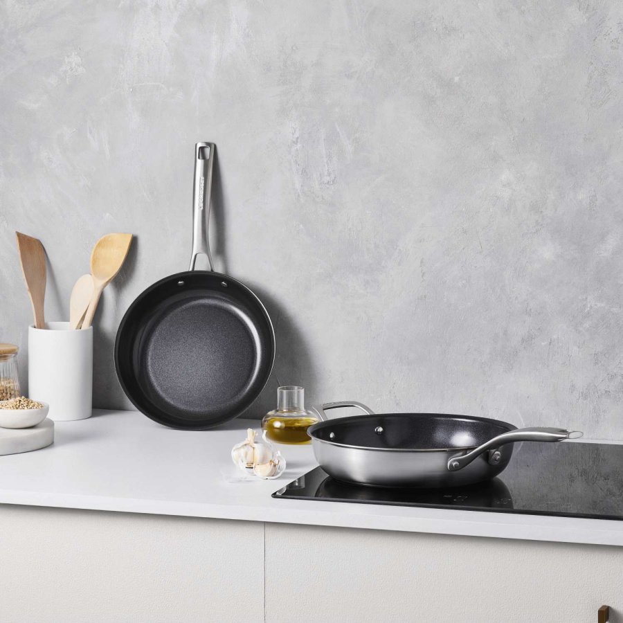 Le Creuset Essentials 3-Ply Pandest m. Belgning 2 stk. 24/28 cm, Rustfrit Stl